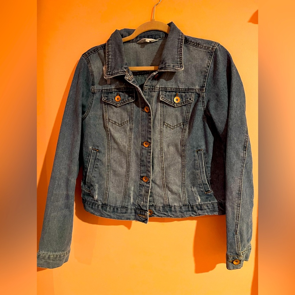 Blue Jean Jacket size M, slightly distressed look.